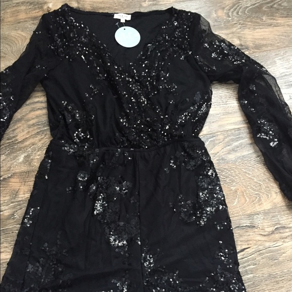 Pants - NWT black Sequined Romper